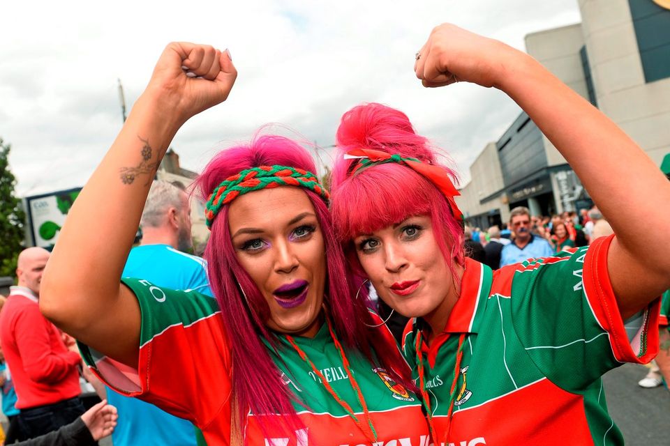 30 August 2015; Mayo supporters Natalie, left, and Marsella Reilly, from Belmullet, Co. Mayo, on their way to the game. GAA Football All-Ireland Senior Championship, Semi-Final, Dublin v Mayo, Croke Park, Dublin. Picture credit: David Maher / SPORTSFILE