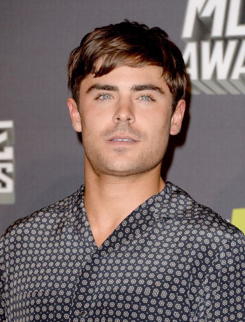 CULVER CITY, CA - APRIL 14:  Actor Zac Efron poses in the press room during the 2013 MTV Movie Awards at Sony Pictures Studios on April 14, 2013 in Culver City, California.
