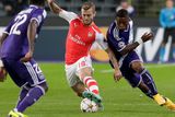 thumbnail: Anderlecht's Gohi Bi Zoro Cyriac, right, attempts to tackle Arsenal's Jack Wilshere during the Group D Champions League match between Anderlecht and Arsenal