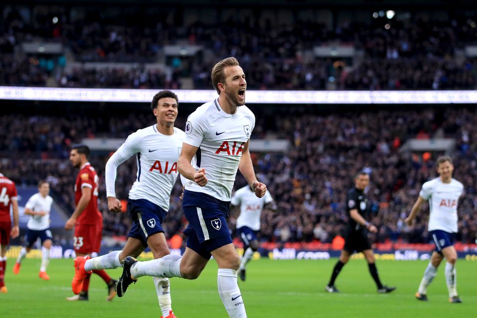 Tottenham's Harry Kane celebrates scoring his side's fourth goal of the game against Liverpool