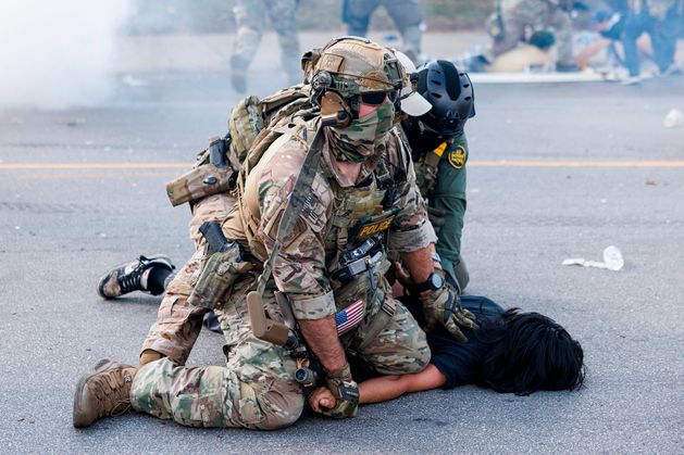 Tensions rise in Portland and Chicago as Trump deploys 300 National Guard troops amid legal battles