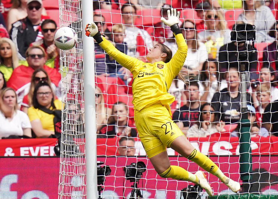 Manchester United goalkeeper Mary Earps makes a save (Adam Davy/PA).