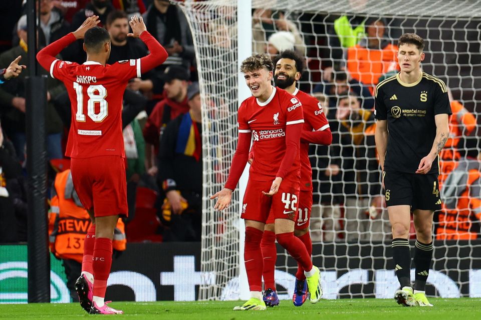 Liverpool's Bobby Clark celebrates scoring their second goal with Cody Gakpo and Mohamed Salah