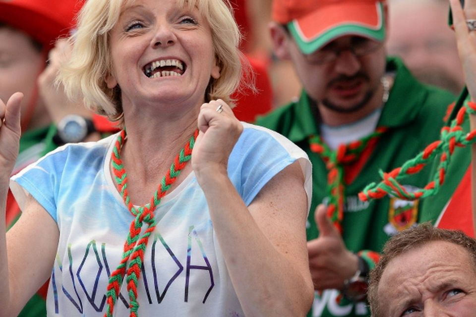 Mayo supporter Henrietta O'Connell, from Kiltimagh, Co. Mayo, celebrates a score.