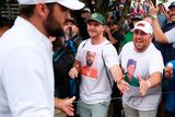 thumbnail: Scottie Scheffler is greeted by supporters after completing his second round at the USPGA