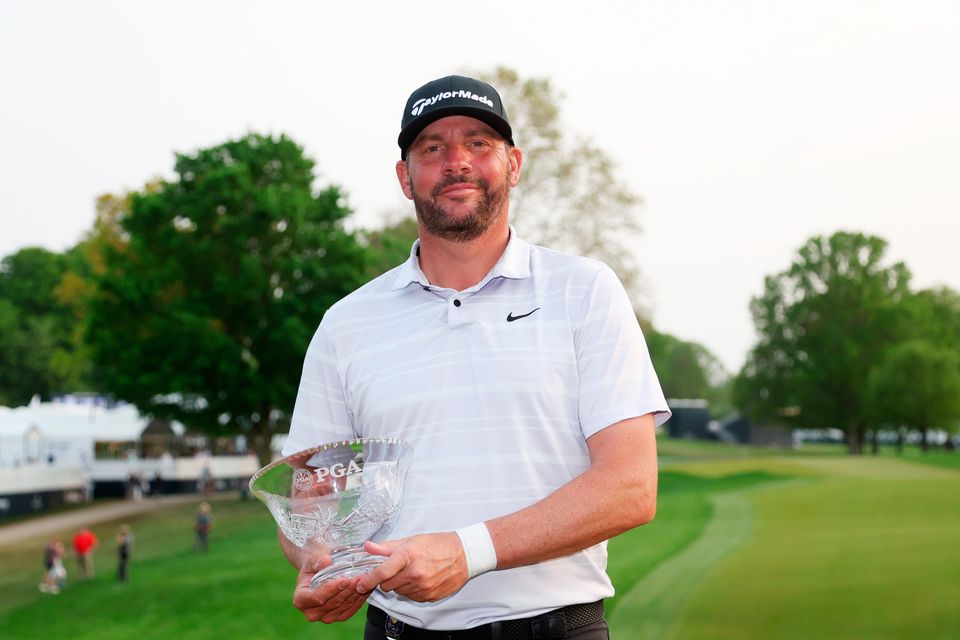 Michael Block of the United States, PGA of America Club Professional, celebrates with Low Club Professional trophy after the final round of the 2023 PGA Championship at Oak Hill Country Club
