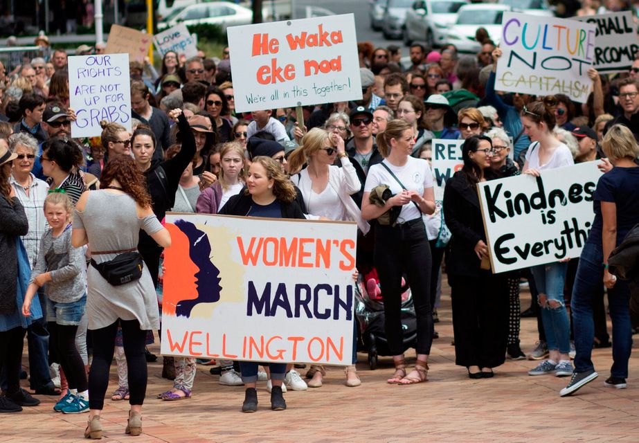 Participants of a rally regarding women's rights hold placards as they march in Wellington, New Zealand, January 21, 2017 the day after Donald Trump's inauguration as President of the United States.    Joshua Gimblett/Handout via REUTER