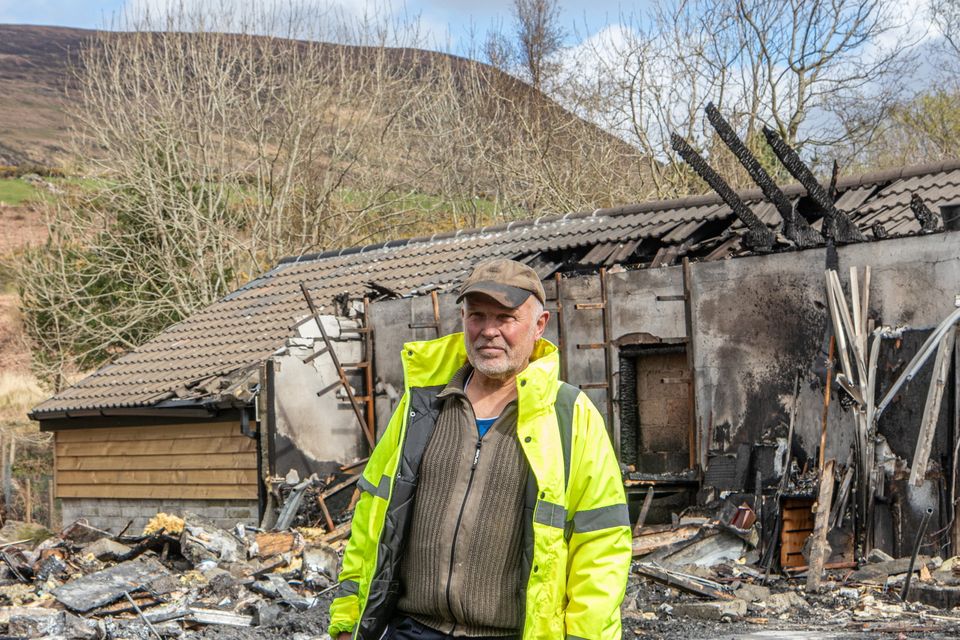 Pieter J Bot at the site where his house burnt to the ground on Good Friday. Photo by Michael Donnelly.