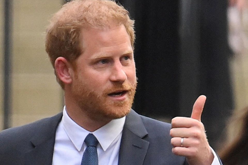 Britain's Prince Harry gestures outside the High Court in London Photo: Reuters/Toby Melville