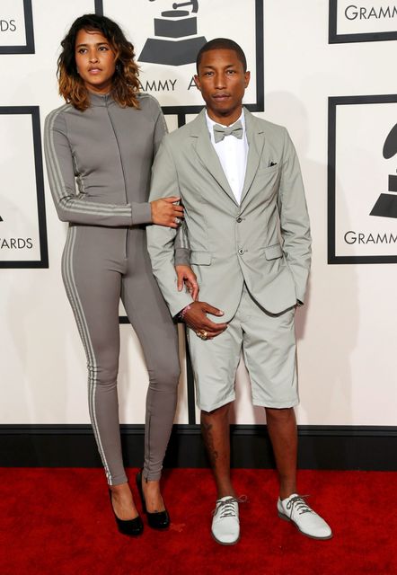 Pharrell Williams and Helen Lasichanh arriving to the Chanel show