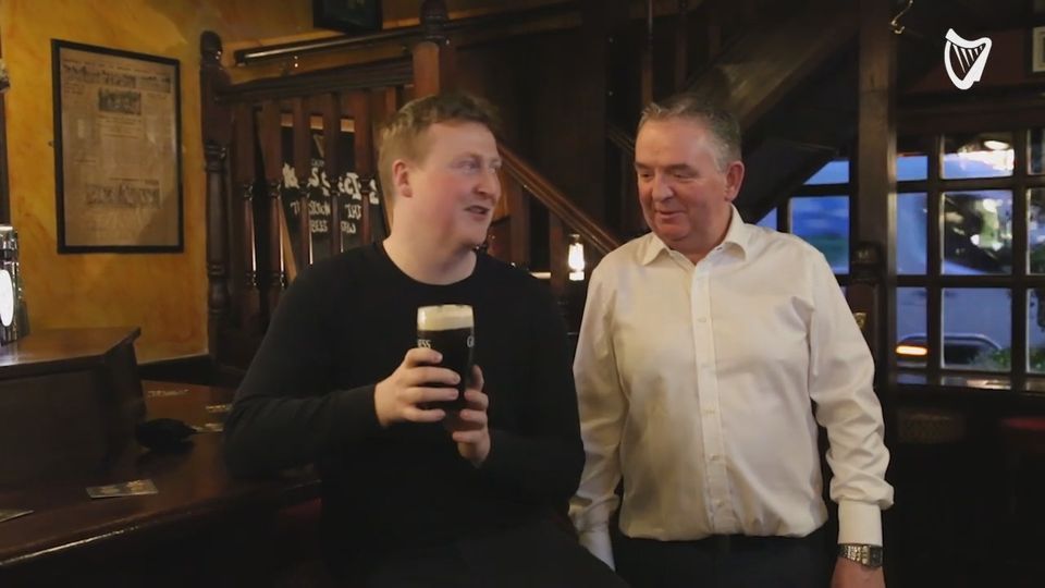 Hugh Hourican (right) of the Boar's Head with an early customer on Good Friday