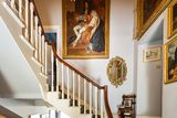 thumbnail: Artwork adorns the commanding winding stairwell
