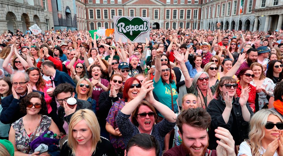 Members of the public celebrate at Dublin Castle after the results of the referendum on the 8th Amendment 
Photo: Niall Carson/PA Wire