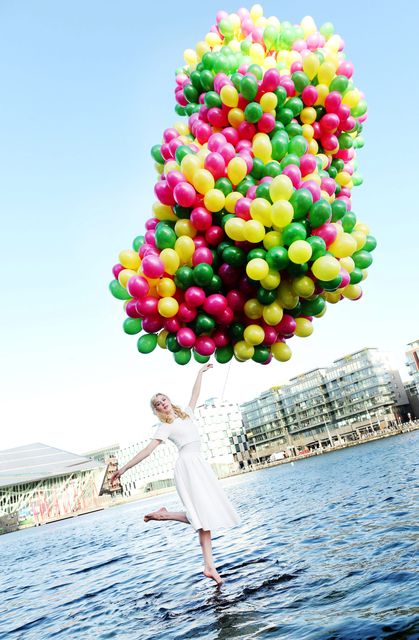 To celebrate Three welcoming 1.5 million O2 customers to Three, Ballerina Isabelle Cooke from Sutton, dances on water at Dublin's Grand Canal Dock yesterday. Photo: Maxwells