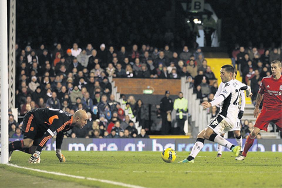 Fulham's Clint Dempsey (left) celebrates after scoring the opening