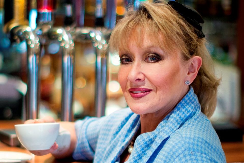 Adèle King (Twink) enjoys a coffee at the bar. Picture: David Conachy