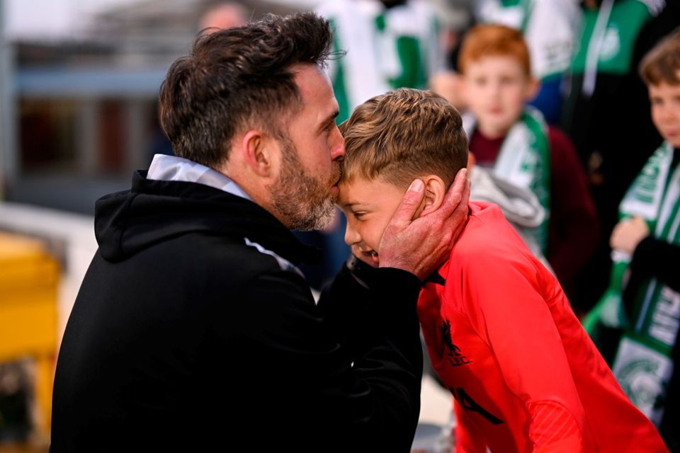 Shamrock Rovers manager Stephen Bradley celebrates with his son Josh after Dundalk victory