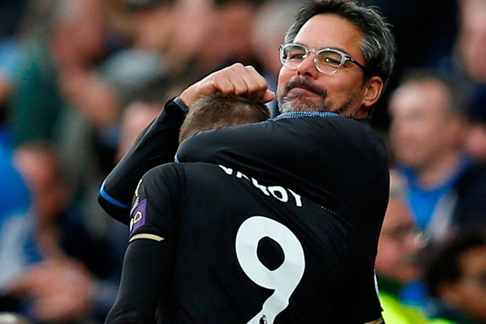 Huddersfield Town manager David Wagner embraces Leicester City's Jamie Vardy after the match