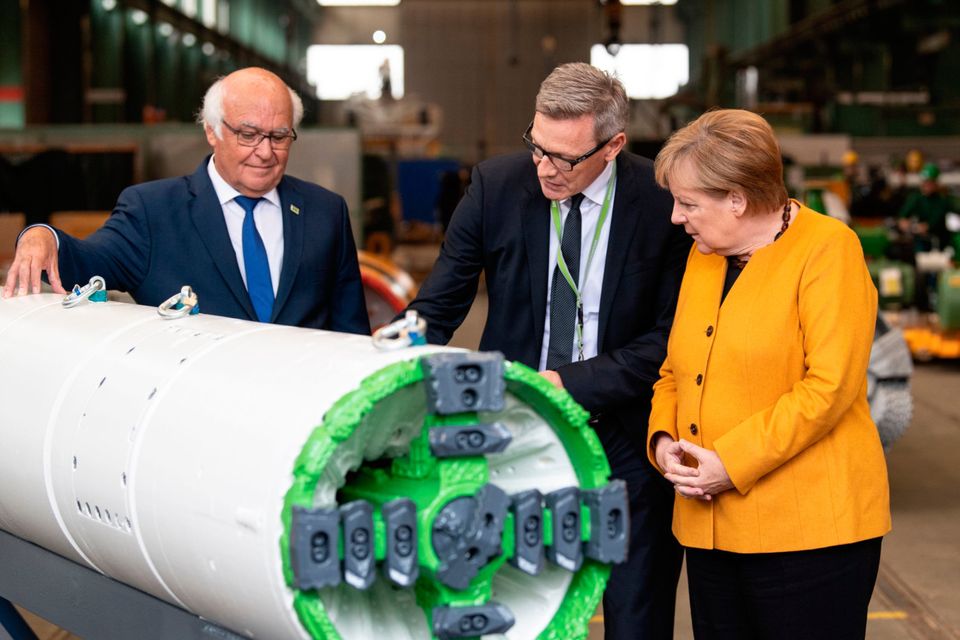 German leader Angela Merkel on a factory tour yesterday: Photo:AFP via Getty