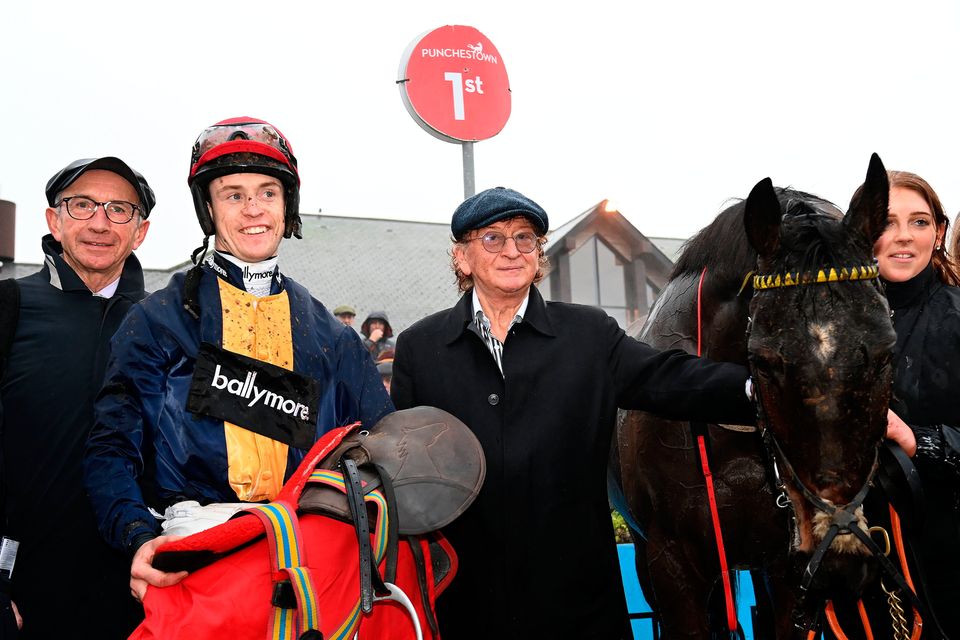 Jockey JJ Slevin celebrates with trainer Martin Brassil and owner Sean Mulryan after Fastorslow wins the John Durkan Memorial Punchestown Chase. Photo: PA Wire