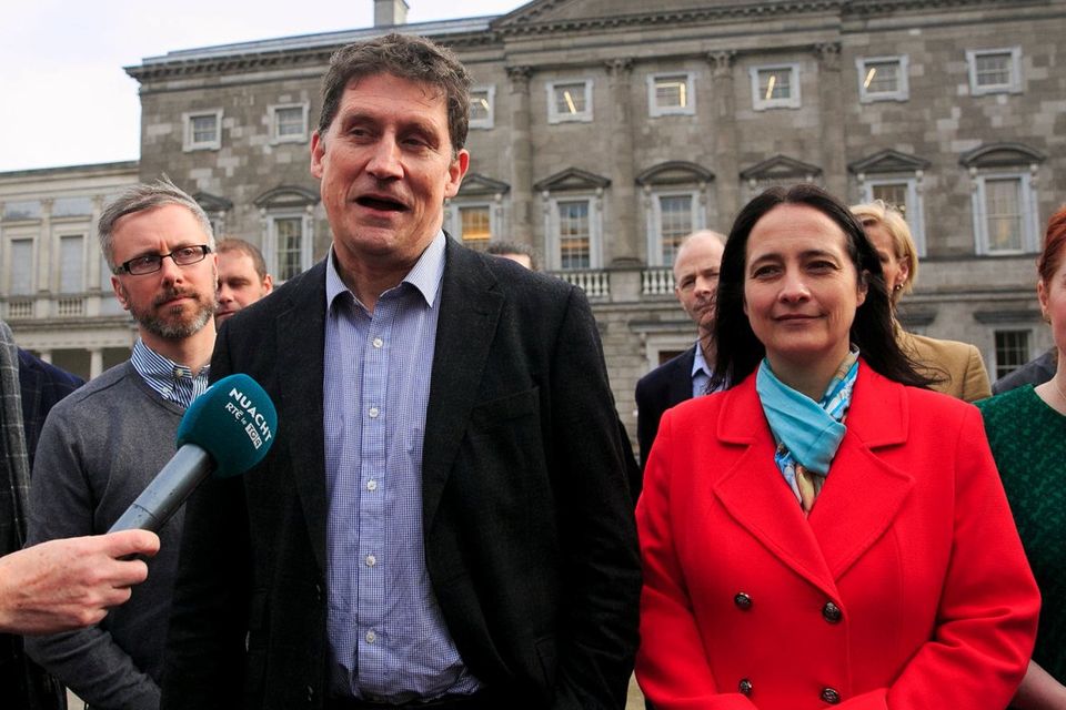 Decision to make: Green Party leader Eamon Ryan and deputy leader Catherine Martin with Green Party TDs during a press briefing at Leinster House. Photo: Gareth Chaney/Collins