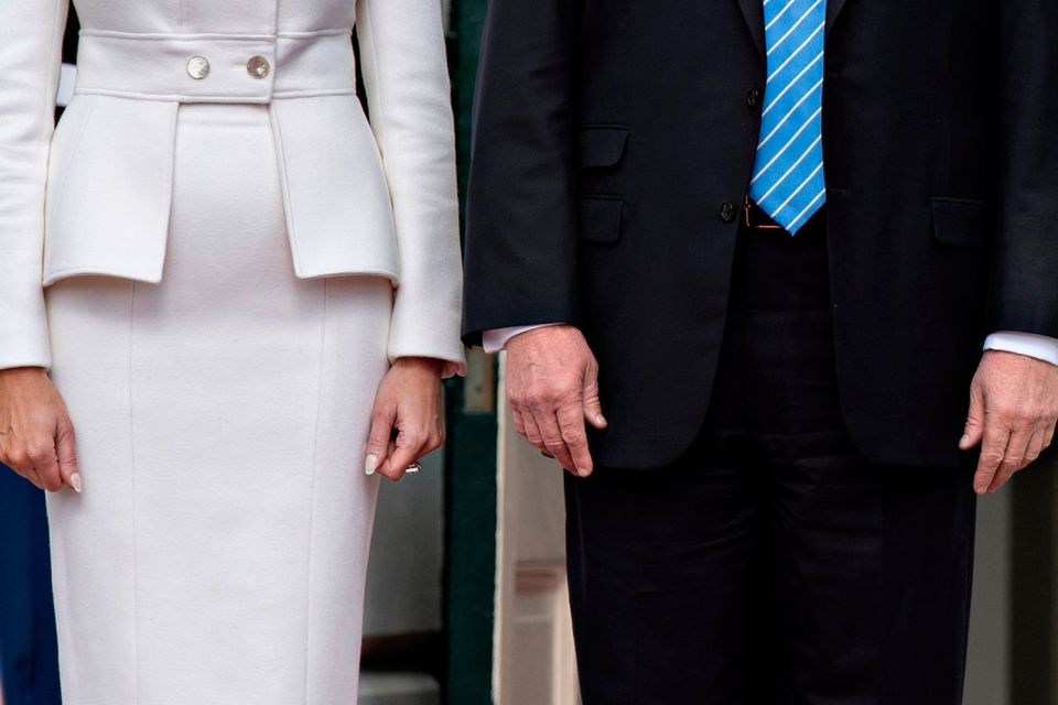 U.S. President Donald Trump and first lady Melania Trump wait to greet Israeli Prime Minister Benjamin Netanyahu and his wife Sara Netanyahu at the South Portico of the White House on February 15, 2017 in Washington, D.C.