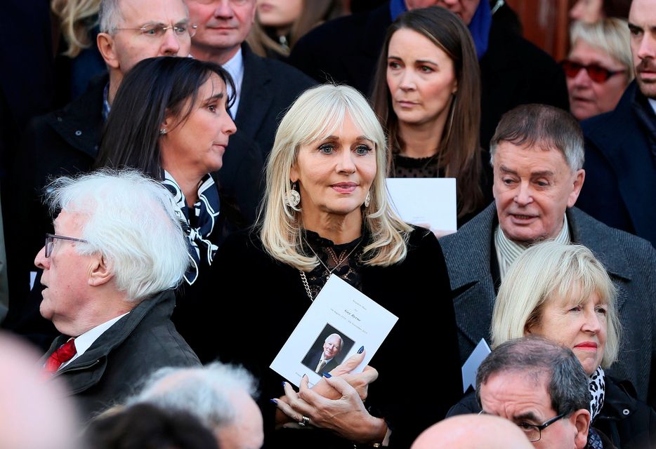 RTE broadcaster Miriam O'Callaghan (centre) among the mourners on the steps of St. Mary's Pro-Cathedral in Dublin following the funeral service of celebrated broadcaster Gay Byrne. Brian Lawless/PA Wire