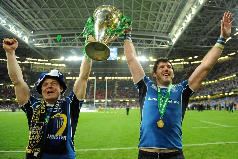 Brian O'Driscoll and Shane Horgan celebrate with the Heineken Cup after the 2011 final.