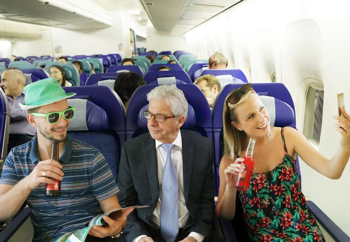 Losing our manners: Hogging the armrests, not using headphones, taking off socks – are you a toxic traveller?