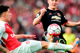 thumbnail: Arsenal's Hector Bellerin (left) battles against Bastian Schweinsteiger for the ball