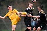 thumbnail: Darby Purcell tussling for the ball with Mountbellew goalscorers Ryan Nolan and Ciarán Mulhern.