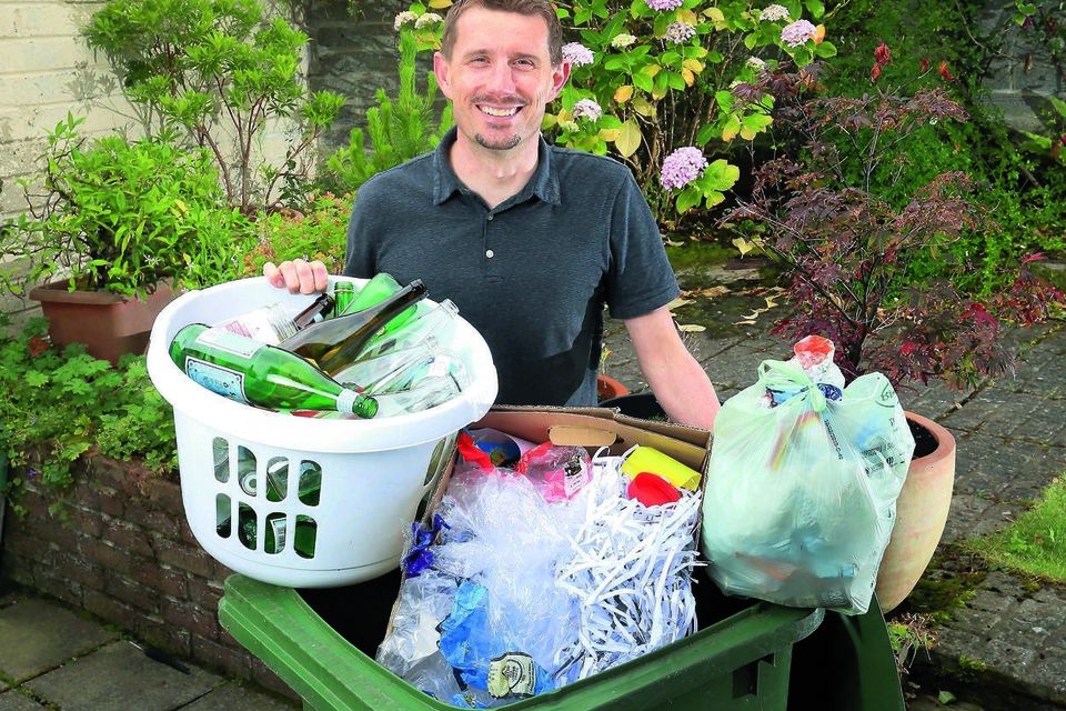 Pól Ó Conghaile with his recycling which he and his family collect in separate containers at their home in Greystones, Co Wicklow. 
Photo: Frank McGrath
