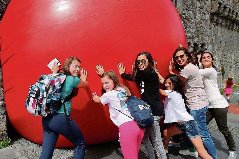 Joint Redball by US artist Kurt Perschke's adopted Galway as its canvas to block the Spanish Arch for the day, it was lots of fun for tourist and children as part of Galway International Art Festival.