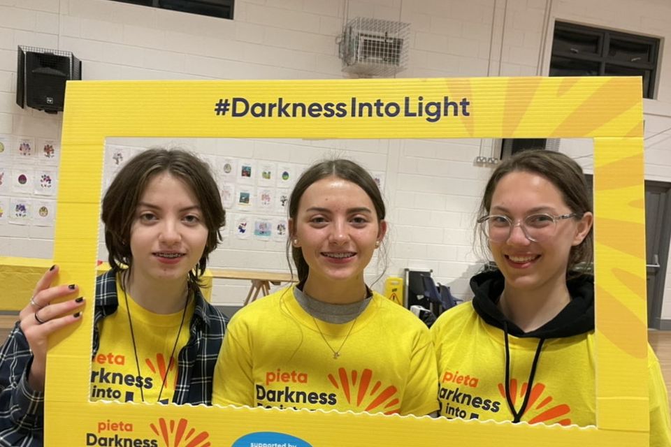 Volunteers Seren Byrne, Ellie Dolan and Kate Dolan from Colaiste Bride pictured ahead of the Tinahely Darkness into Light walk.