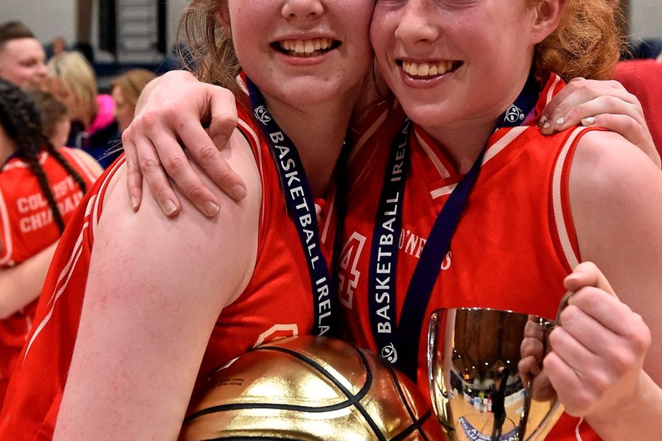 20 January 2015; Colaiste Chiarain Leixlip captain Sorcha Tiernan, right, celebrates with the team-mate Niamh Materson, MVP award winner, after the game. All-Ireland Schools Cup U16A Girls Final, Colaiste Chiarain Leixlip v Gael Cholaiste Mhuire A.G, National Basketball Arena, Tallaght, Dublin. Picture credit: David Maher / SPORTSFILE