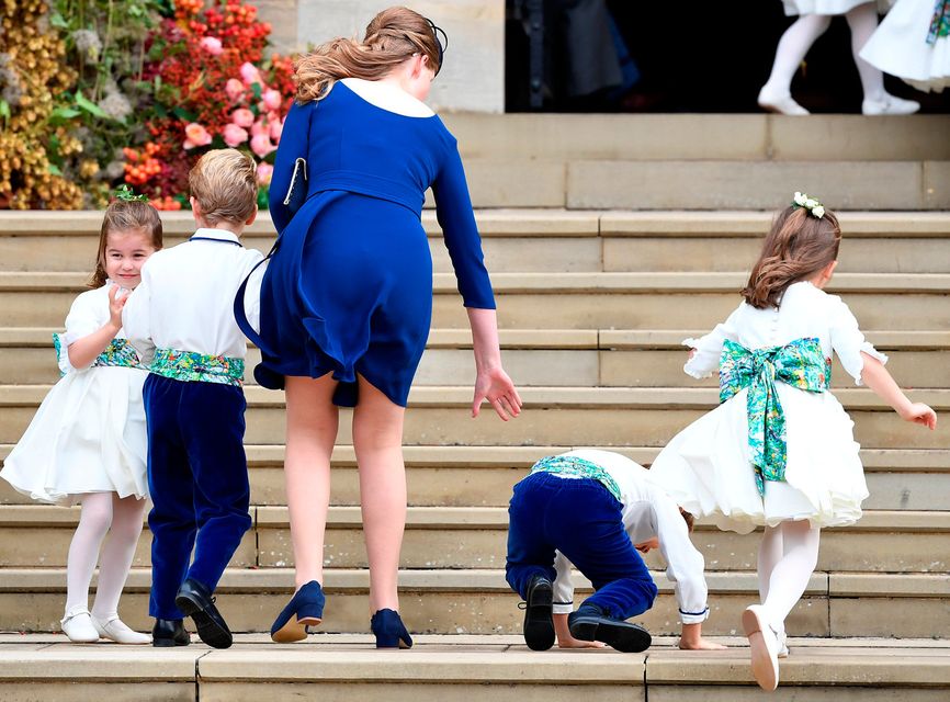 Princess Charlotte of Cambridge arrives with bridesmaids and pageboys for the royal wedding of Princess Eugenie and Jack Brooksbank at St George's Chapel in Windsor Castle, Windsor, Britain October 12, 2018. REUTERS/Toby Melville