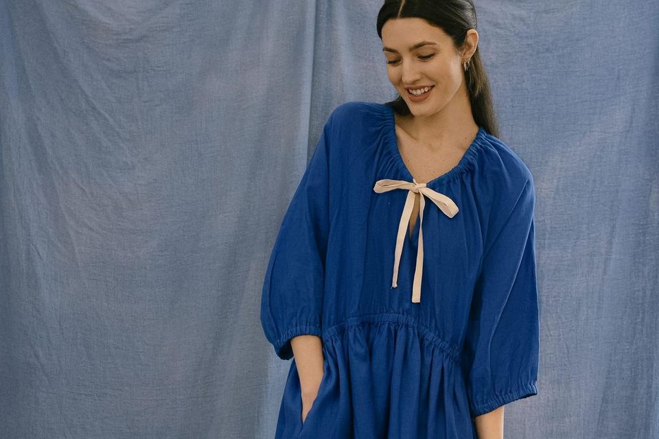 The Gathered bow dress in blue Irish Linen, €335, niamhoneill.com