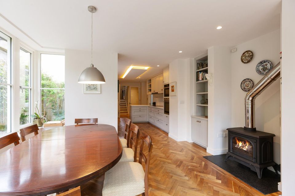 The dining area which leads into the kitchen