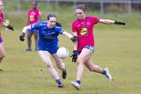 thumbnail: Niamh Kavanagh of St. Mary's makes a clearance while being challenged by Coláiste Bhríde's Eimear Murphy. 