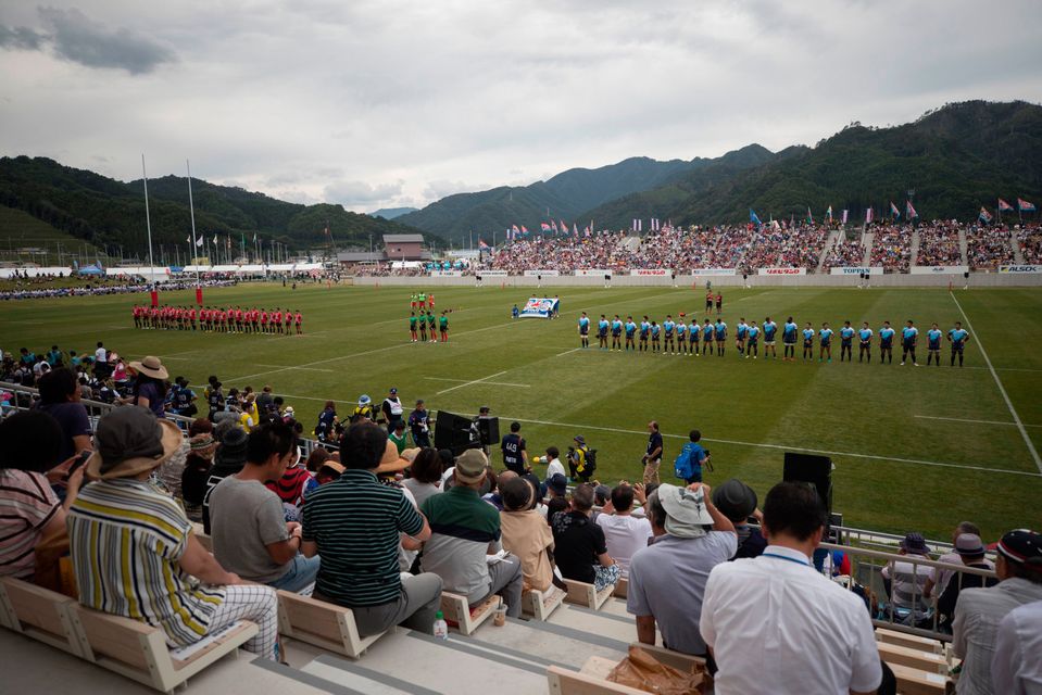 The Kamaishi Seawaves and Yamaha Jubilo players attend a memorial match during the opening ceremony of the Kamaishi Recovery Memorial stadium last month in Japan. Photo: BEHROUZ MEHRI/AFP/Getty Images