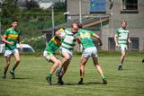 thumbnail: Darragh Byrne of Ballymanus breaks through the challenges of Kilcoole's Shane Collins and Ronan Keddy.