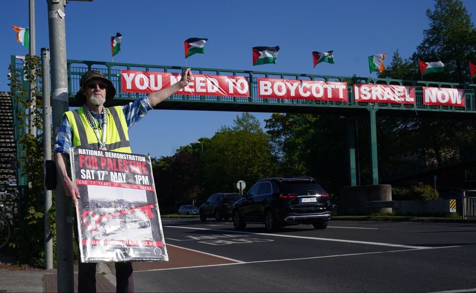 People attend a pro-Palestine protest outside RTE in Dublin (Brian Lawless/PA)