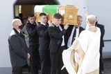 thumbnail: The coffin of Red Óg Murphy is carried from the church. Pic: Carl Brennan.