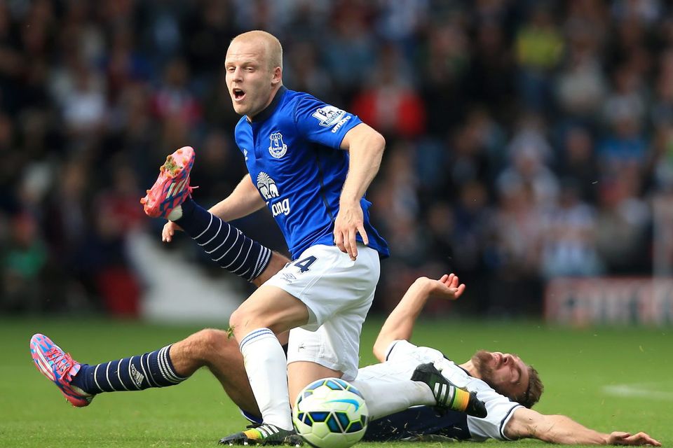 West Brom's James Morrison battles for the ball with Everton's Steven Naismith