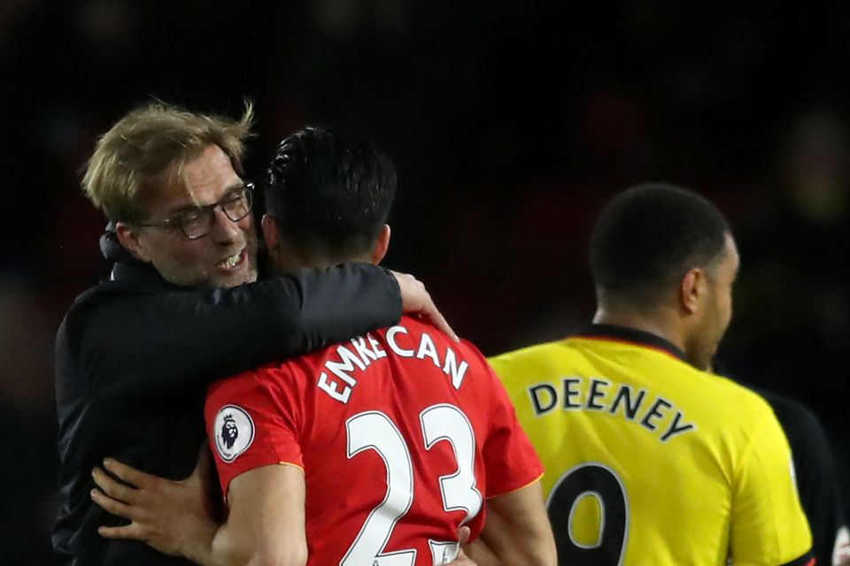 Jurgen Klopp, pictured left, insists he will not put pressure on Emre Can to sign a new contract