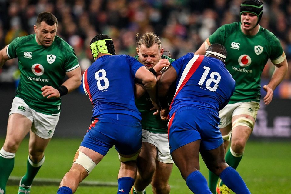 Finlay Bealham of Ireland is tackled by Gregory Alldritt, left, and Demba Bamba of France during the Six Nations match at Stade de France last year. Photo: Seb Daly/Sportsfile