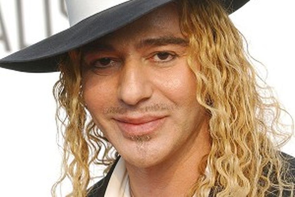 John Galliano attempts fashion comeback after four years