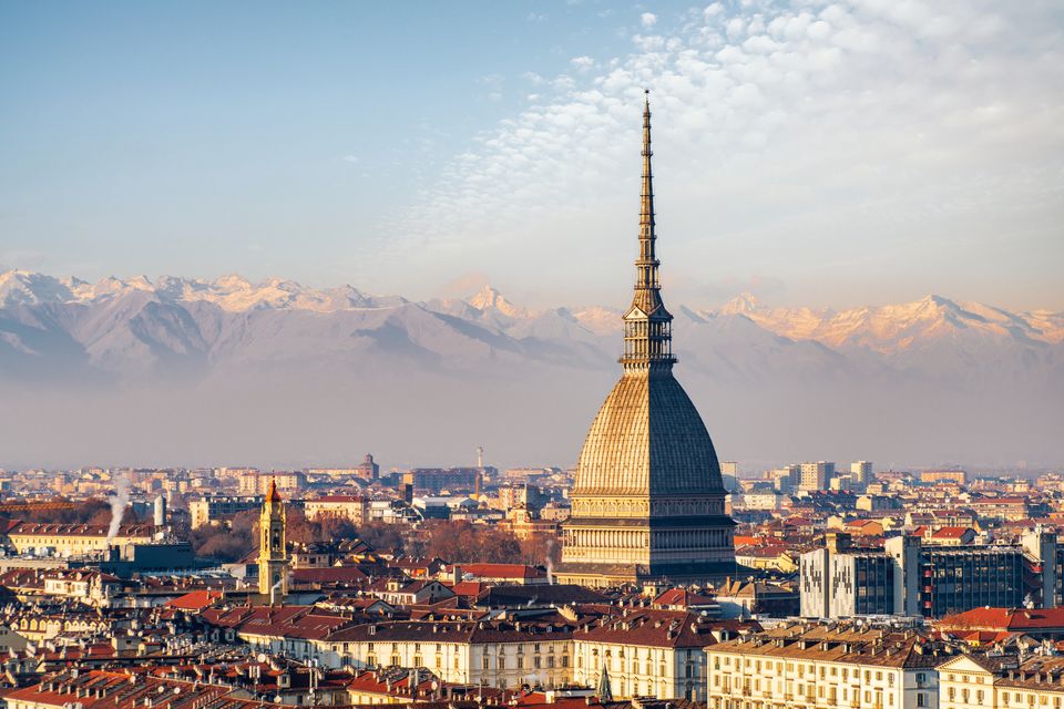A panoramic view of Turin skyline with the snow-capped Alps in the distance