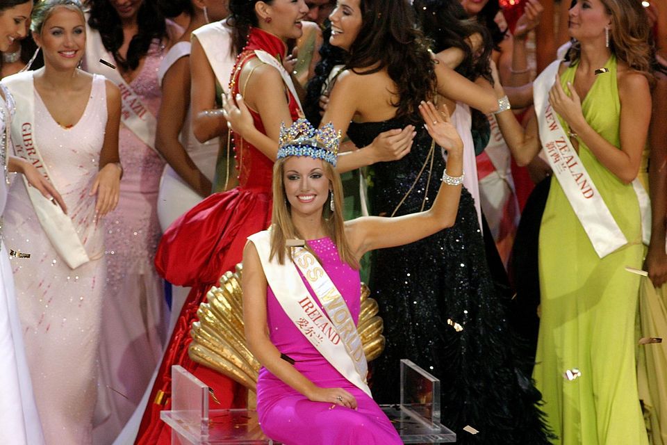 The new Miss World Rosannna Davison from Ireland waves to the crowd after winning the Miss World 2003 title December 6 2003 in Hainan, China. The live show was watched by a worldwide TV audience and for the first time allowed the public to vote for their favorite contestant using the internet. (Photo by Getty Images)