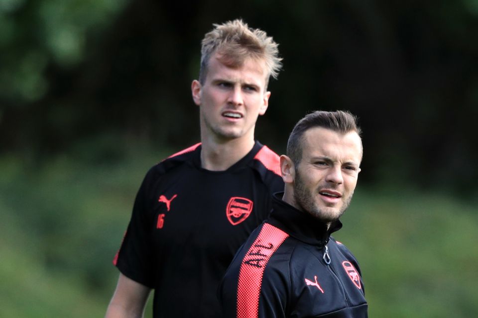 Jack Wilshere, right, is set to play in his first Arsenal match in over a year